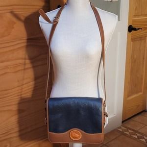 Vintage Dooney and Bourke all weather leather navy and brown purse